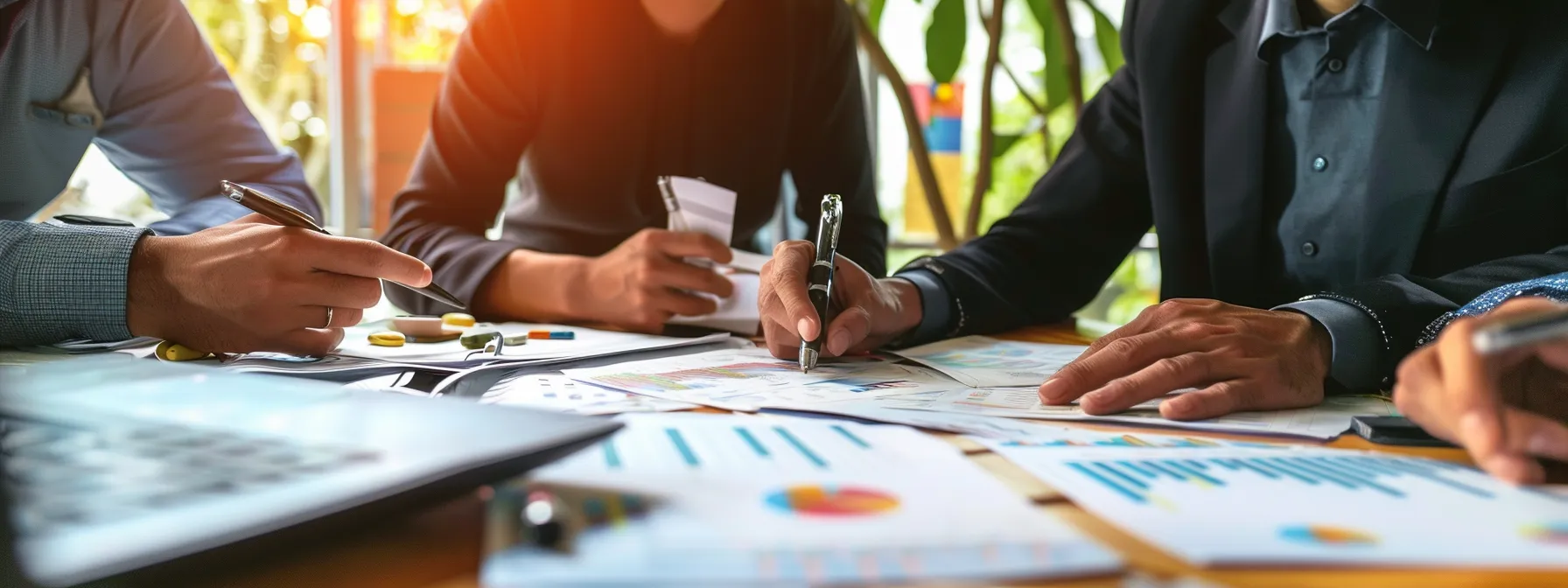 a group of business professionals reviewing data charts on gut health supplements.