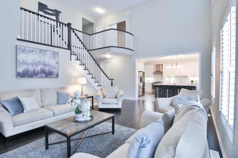 a living room with a staircase