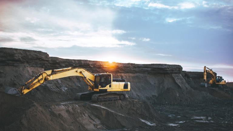 a construction vehicle on a hill