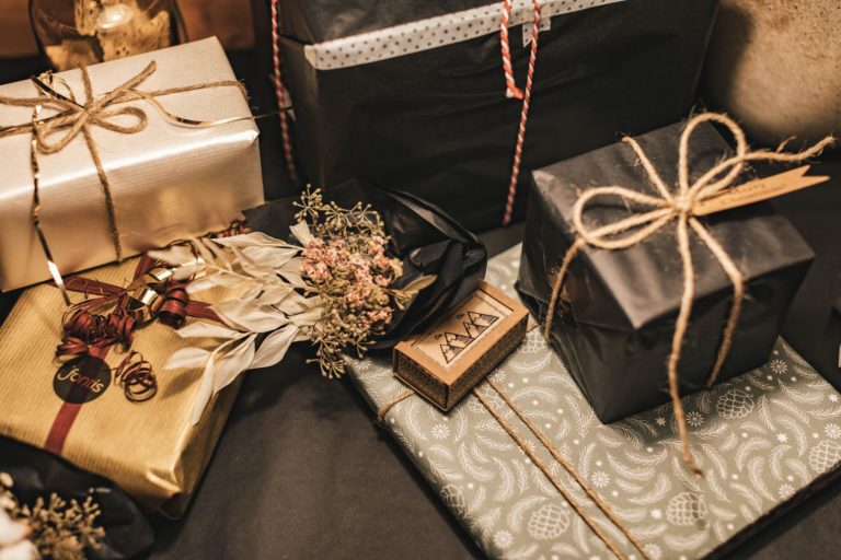 a table with a basket and a basket with decorations