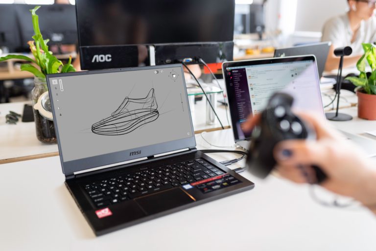 a couple of laptops on a table