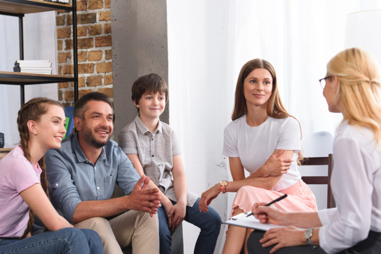 a group of people sitting in a room