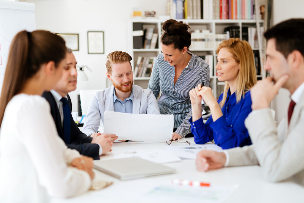 a group of people discussing something