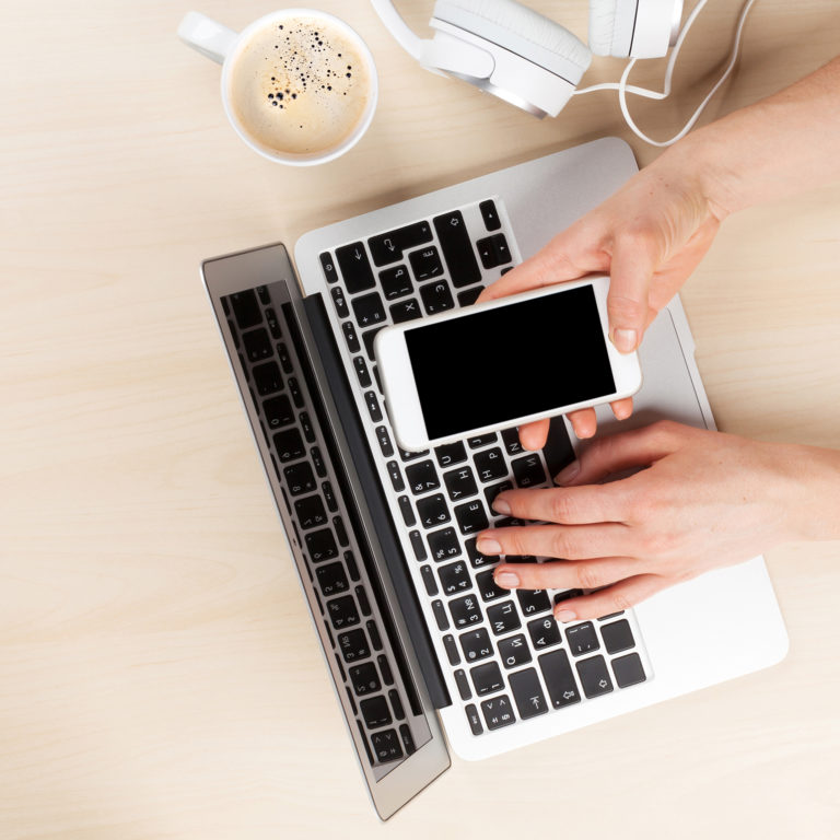 a person typing on a laptop