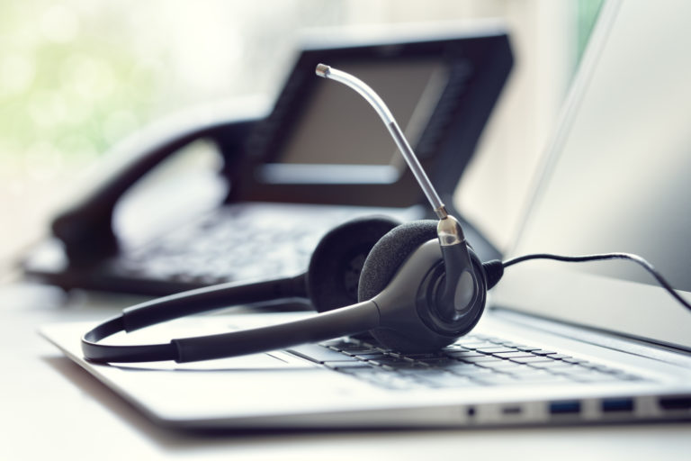 a pair of headphones on a laptop